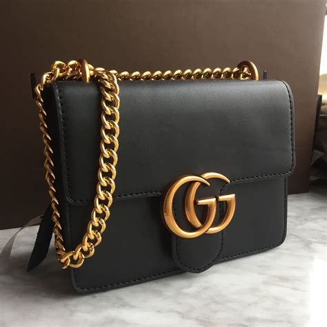 black gucci bag with goldchian and gold bugs|replacement chain for Gucci bag.